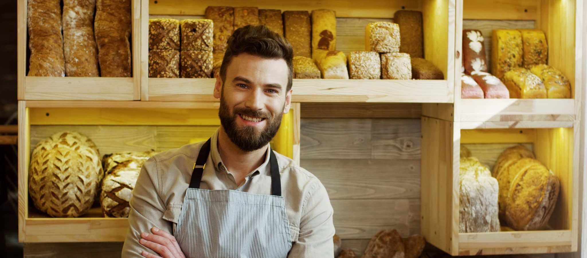 Portrait,of,male,baker,working,in,bakery,shop