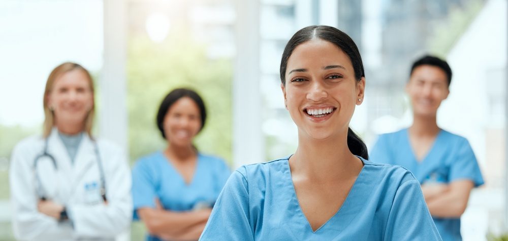 Portrait,,medical,and,a,woman,nurse,arms,crossed,,standing,with